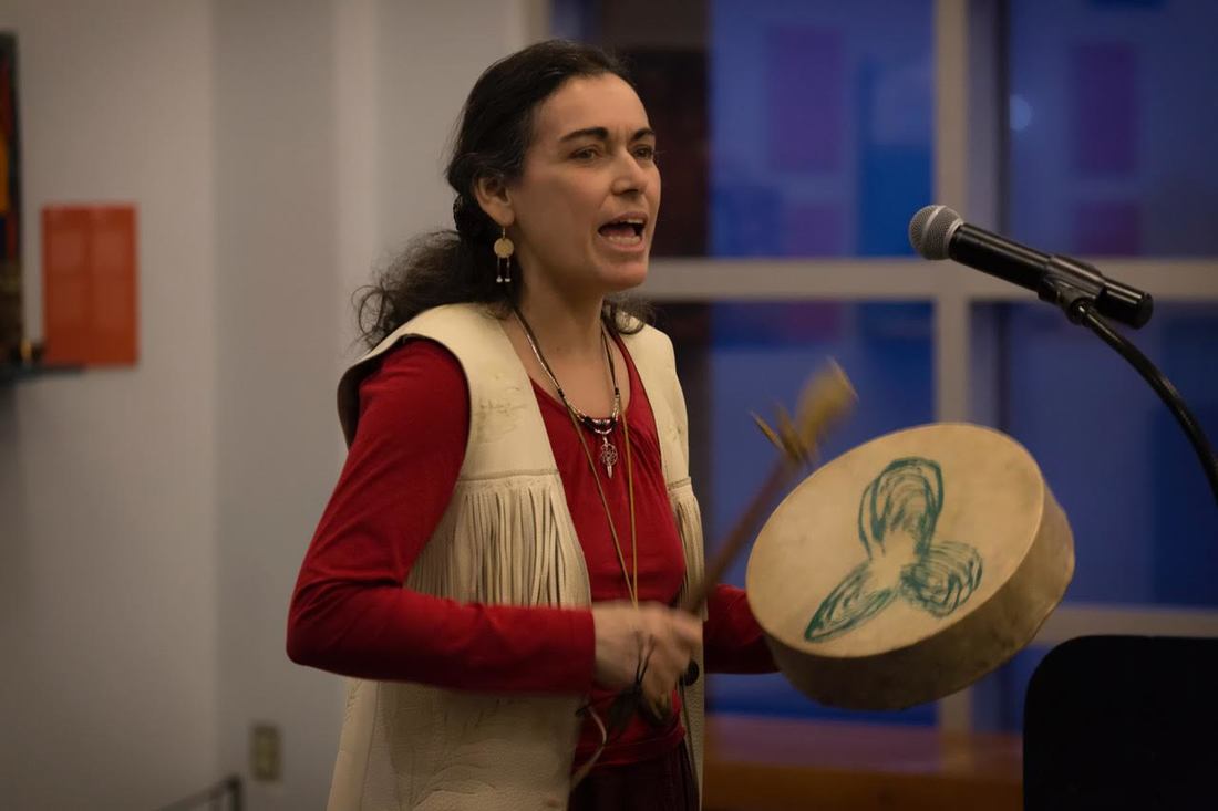 Joan Smith of the indigenous drumming group All Nations Drum performs a traditional welcome song during the opening of Mosaic: Identity and Community Connection art exhibit, March 8th, 2017.